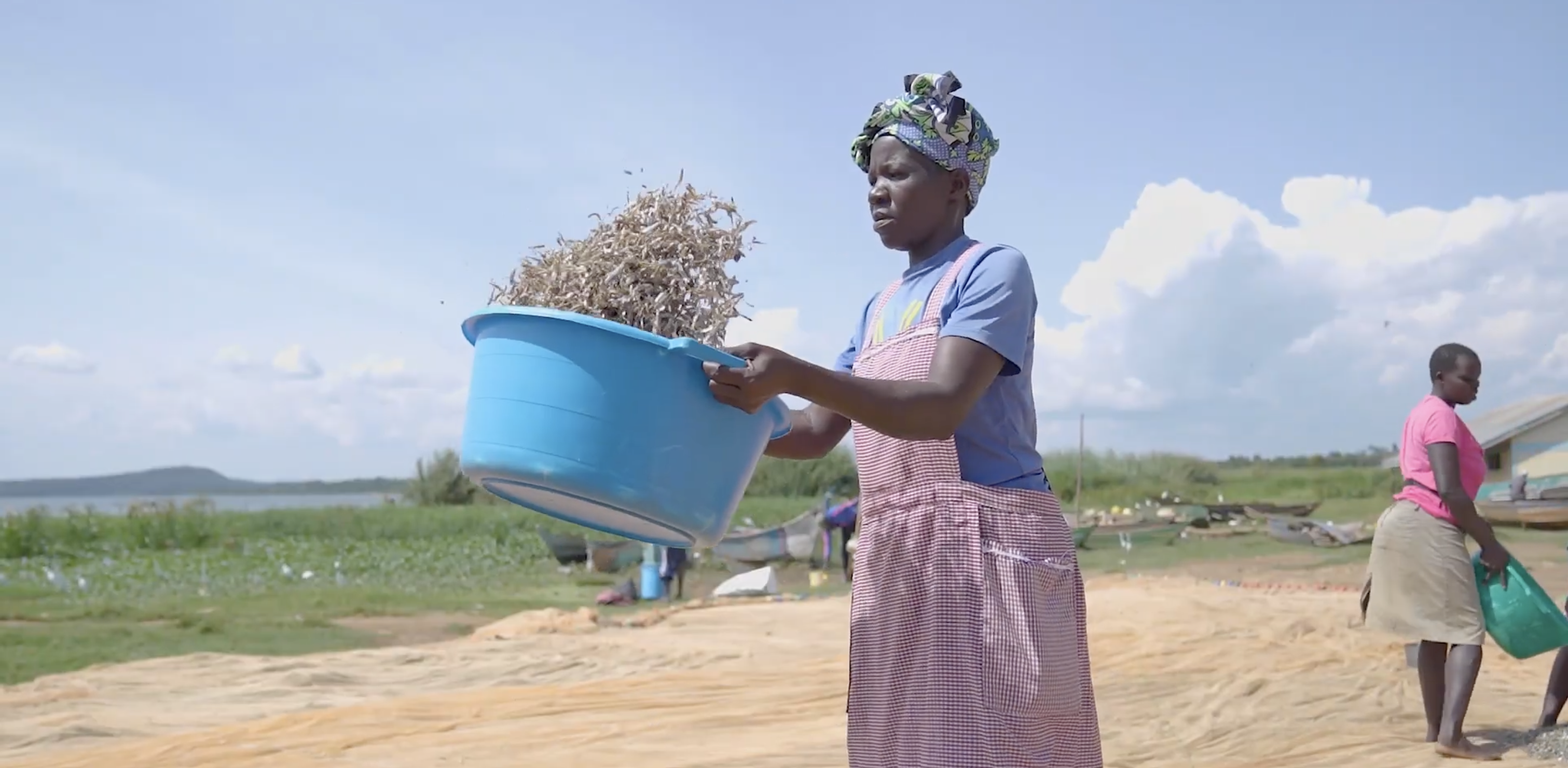 GreatLakes Feeds woman employee processing fish
